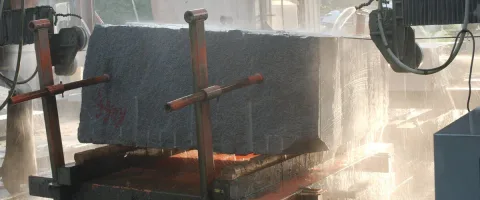 Savannah Gray Granite block face during fabrication at Ruff Dimensional Stone.