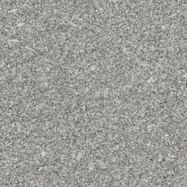 Light gray, fine-grained Concord Gray granite with small dark and brown flecks.