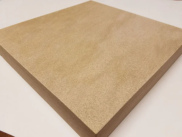 Warm tan Fossil Creek Stone sample with a fine-textured surface and sawn edges.