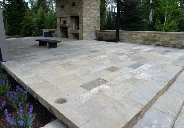 Frontier Sandstone — sawn paving in a producer-documented application.