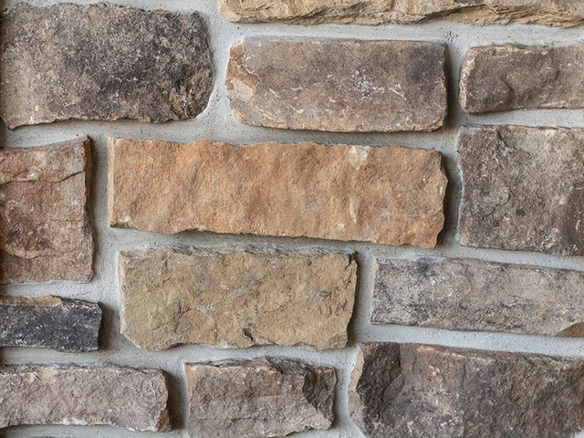 Weathered Ledge fieldstone veneer with gray, brown and tan natural faces.