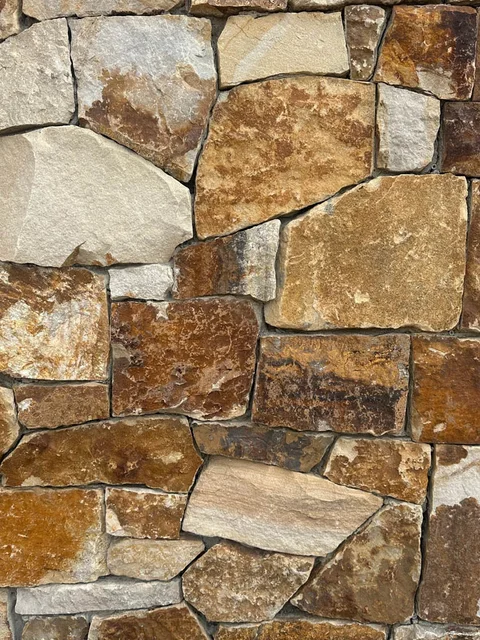 Goldstone sandstone · building veneer.