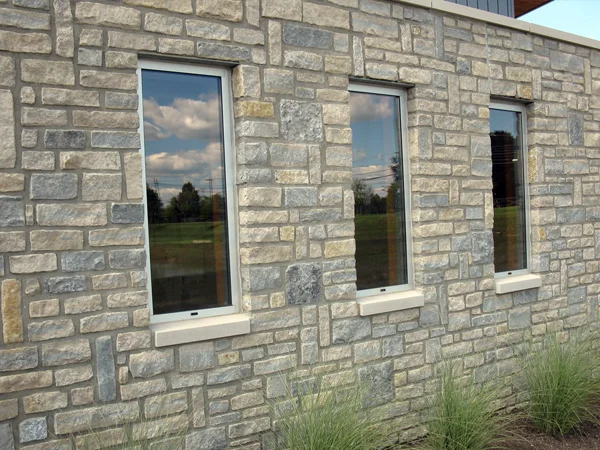 Erie Shore Blue Vein · installed split ashlar.