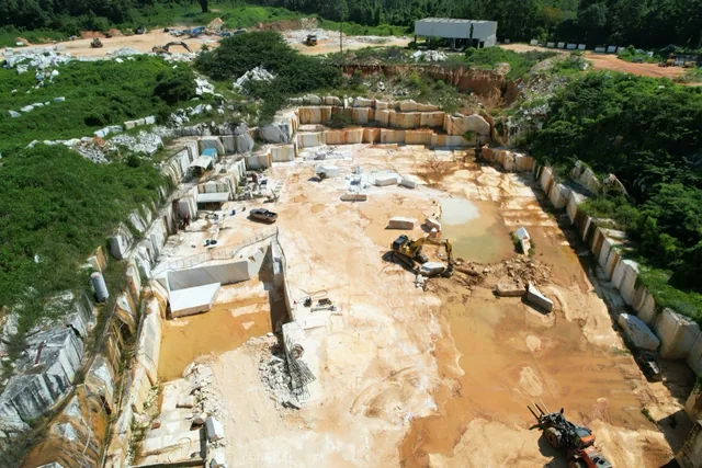 Aerial view of exposed marble benches and cut areas at Sylacauga Marble Quarry.
