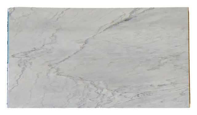 Silver Cloud marble slab with a pale ground and restrained gray movement.