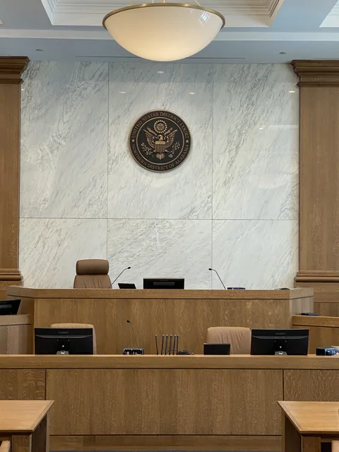 Silver Cloud marble wall panels behind the judge’s bench at the Anniston Federal Courthouse.