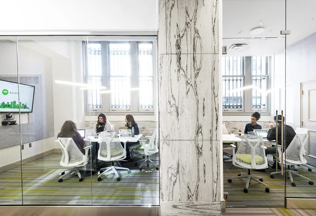 An Alabama Scuro marble pier between meeting rooms at Shipt Tower.