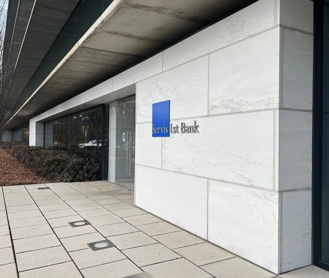 Silver Cloud marble cladding around a Servis 1st Bank entrance.