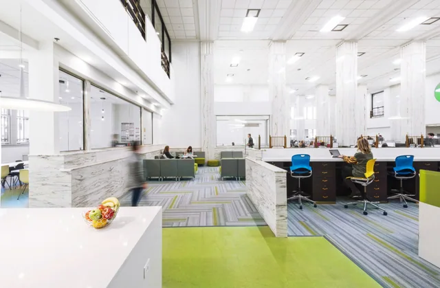 Shipt Tower interior with Alabama Scuro marble wall fields and column surrounds.